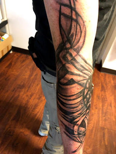 Explore mens throat tattoo ideas, creative tattoo ideas in Seymour, available at American Gypsy Tattoo Corp.