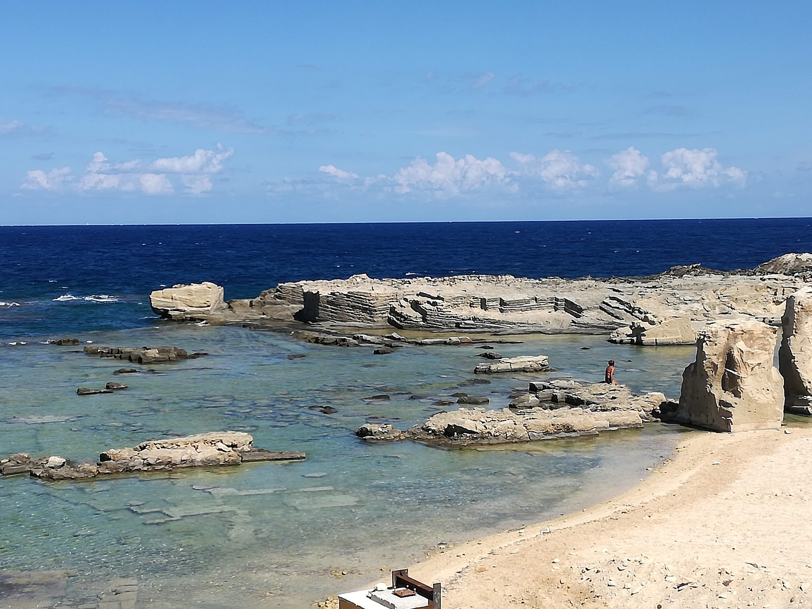 Foto av Cala Graziosa beach med turkos rent vatten yta