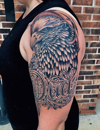 Find dog tattoo idea for your next unique tattoo in Stevens Point at Black Rabbit Tattooing
