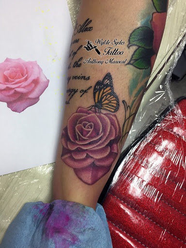Explore dead rose tattoo ideas, creative tattoo ideas in San Diego, available at Wylde Sydes Tattoo & Body Piercing