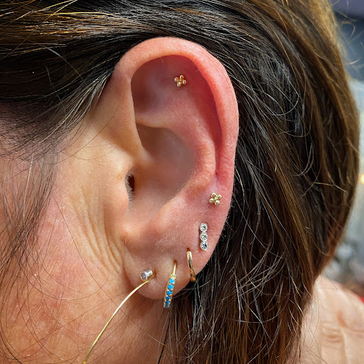 Explore coffee cup tattoo ideas, creative tattoo ideas in Cary, available at Fine Art Body Piercing By Lilith Mae