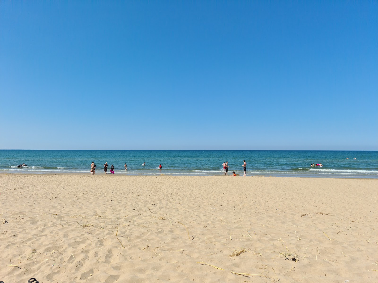 Fotografija Tarhib Plazh z svetel pesek površino