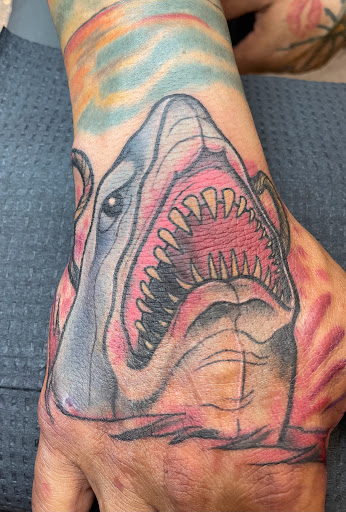 Explore werewolf tattoo ideas, creative tattoo ideas in Houston, available at The Neon Jackal Tattoo