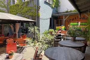 Harlekin Cafe, Bar, Pension, Ferienwohnung image