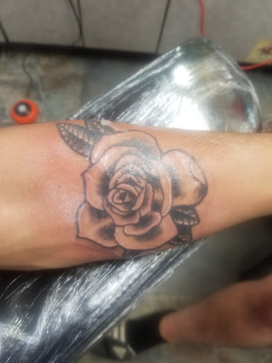 Explore street signs tattoo ideas, creative tattoo ideas in Blackwood, available at Jersey Devil Tattooing & Body Piercing