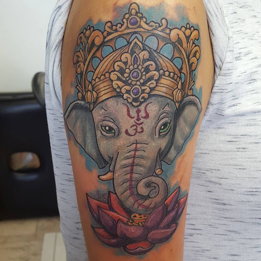 Explore eiffel tower tattoo ideas, creative tattoo ideas in Hampton, available at Blue Horseshoe Tattoo and Body Piercing