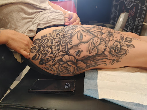 Explore simple flower tattoo ideas, creative tattoo ideas in Newport, available at T N T Explosive Tattoo