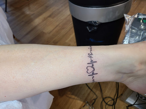 Find underboob tattoo ideas for your next unique tattoo in Manhattan at Black Mammoth Tattoo & Piercing