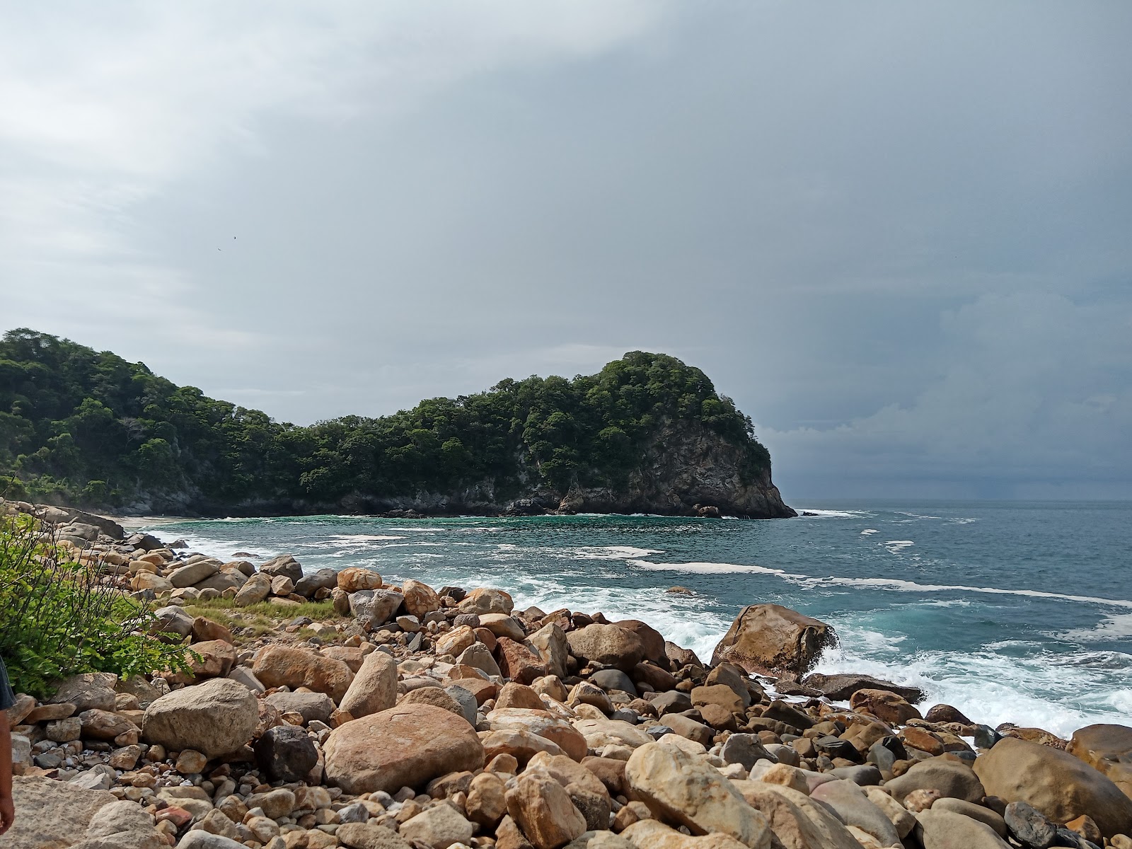 Playa Las Monjitas的照片 带有明亮的沙子和岩石表面