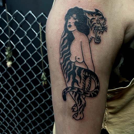 Explore mountain man tattoo ideas, creative tattoo ideas in Buffalo, available at True Gloom Tattoo Studio