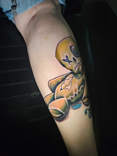 Explore mens filler tattoo ideas, creative tattoo ideas in Angola, available at Hoodlum Ink