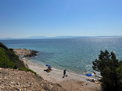 Portixeddu Accuau Beach'in fotoğrafı dağlarla çevrili