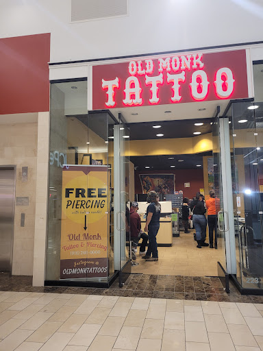 Old Monk Tattoo and piercing