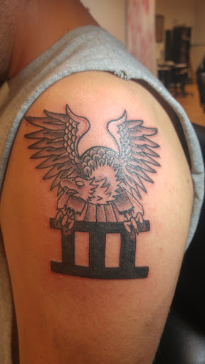 Explore wrist tattoo ideas men, creative tattoo ideas in Le Roy, available at Blood Money Ink