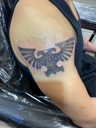 Explore jake the dog tattoo ideas, creative tattoo ideas in Vancouver, available at Headstrong Tattoo Studio & Piercing