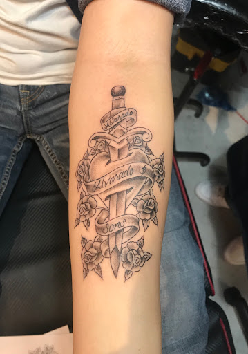 Explore roman numeral birthday tattoo ideas, creative tattoo ideas in El Paso, available at Pumping Ink Tattoo Parlor