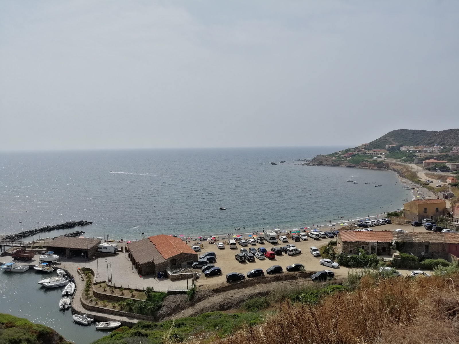 Foto van Porto Palma beach en de nederzetting
