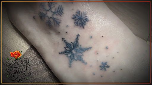 Explore female tattoo placement ideas, creative tattoo ideas in Minocqua, available at Whisky Rose Tattoo Parlor