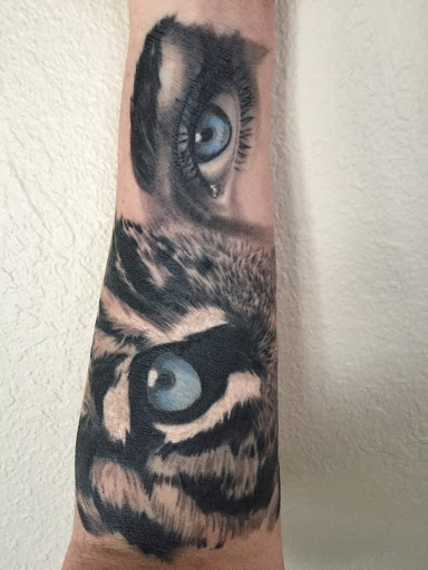 Explore color flower tattoo ideas, creative tattoo ideas in Ogden, available at Savage Tattoo Shop