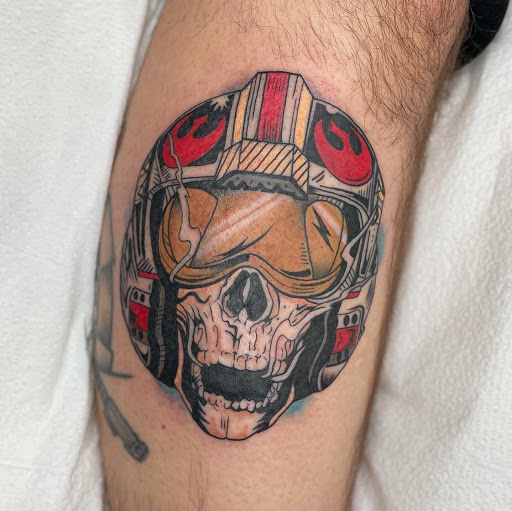 Explore leg tattoo ideas black male, creative tattoo ideas in Wappingers Falls, available at Graceland Tattoo
