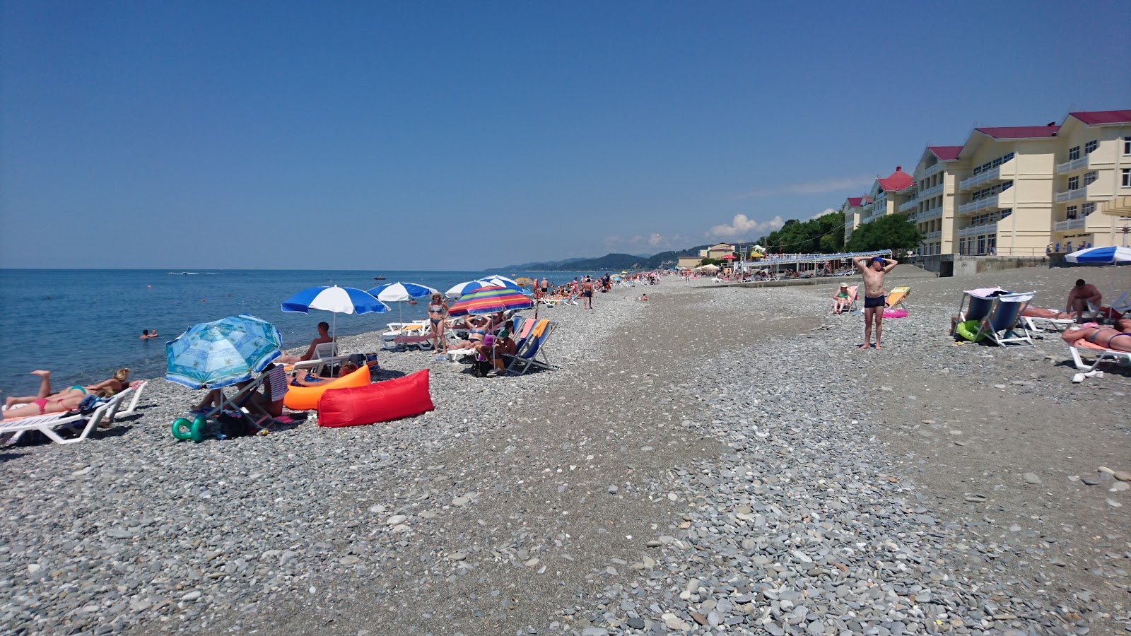 Photo de Loo beach avec rivage droit, long