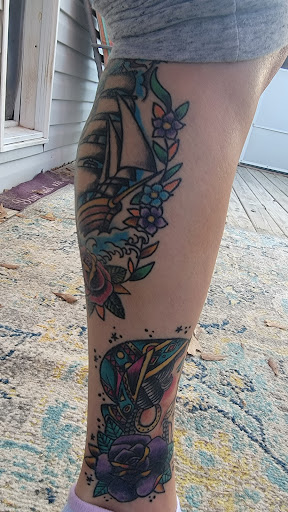 Explore tattoos behind ear ideas, creative tattoo ideas in Ozark, available at Tooth & Nail Tattoo & Piercing