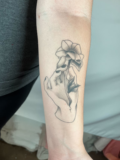 Explore wolf neck tattoo ideas, creative tattoo ideas in Athens, available at Pink Goblin Tattoo & Piercing