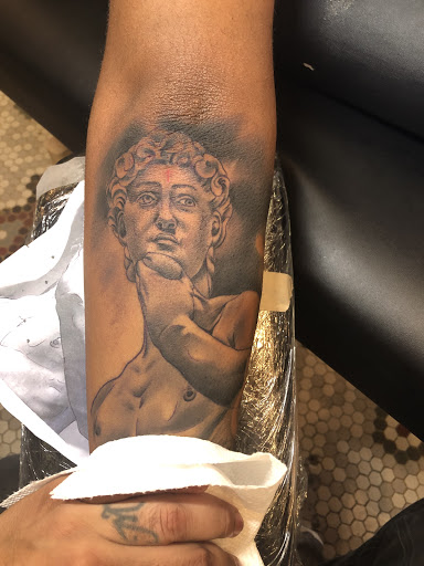 Explore bear paw tattoo ideas, creative tattoo ideas in Junction City, available at New Era Tattoo Studio
