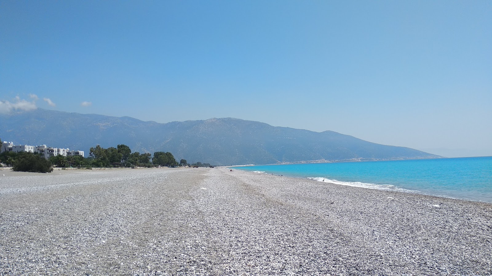 Fotografie cu Cayagzi Beach III cu o suprafață de apă pură albastră