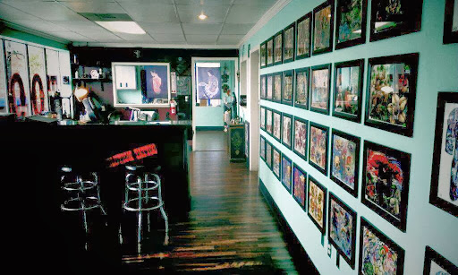 Explore snake sleeve tattoo ideas, creative tattoo ideas in Reno, available at Evolution Tattoo