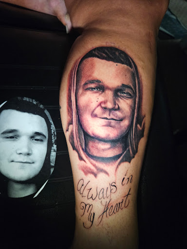 Explore roses tattoo ideas, creative tattoo ideas in Angola, available at Hoodlum Ink