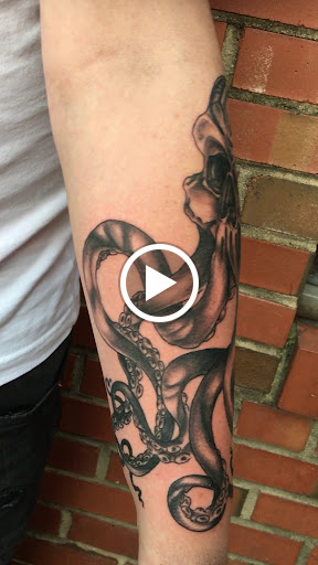 Explore girly sleeve tattoo ideas, creative tattoo ideas in Chapel Hill, available at Golden Falcon Tattoo and Piercing