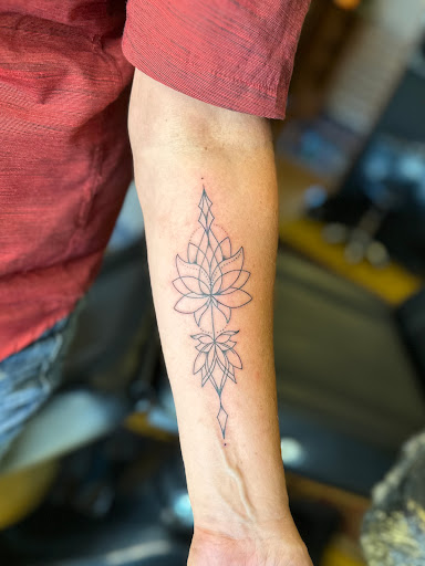 Explore chest tattoo ideas for men, creative tattoo ideas in Prescott, available at Bold as Love Tattoo and Piercing Studio