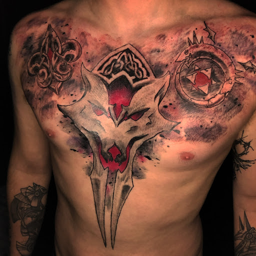 Explore disney tattoo sleeve ideas, creative tattoo ideas in Brunswick, available at Brunswick Tattoo Company