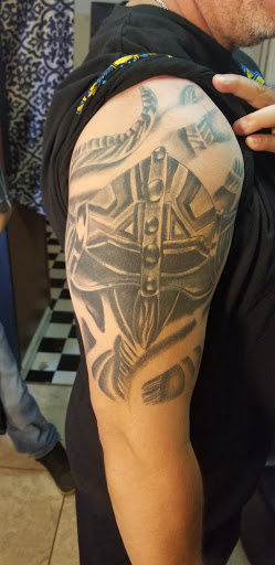 Explore cover up tattoo ideas ankle, creative tattoo ideas in Denver, available at Denvers Competitive Ink