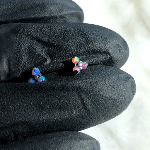 Explore red bird tattoo ideas, creative tattoo ideas in Bloomington, available at Crimson Breed Tattoo Studio