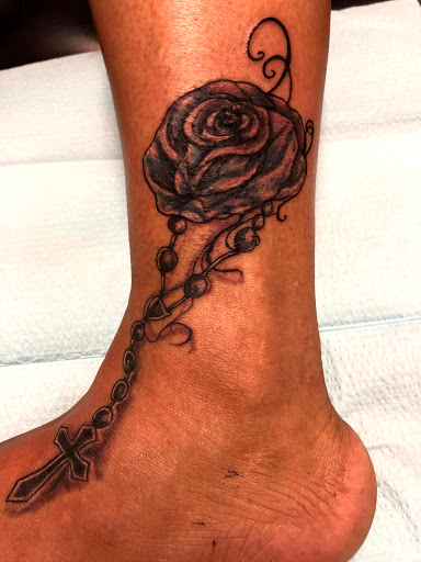 Explore tattoo ideas pets, creative tattoo ideas in Seymour, available at American Gypsy Tattoo Corp.