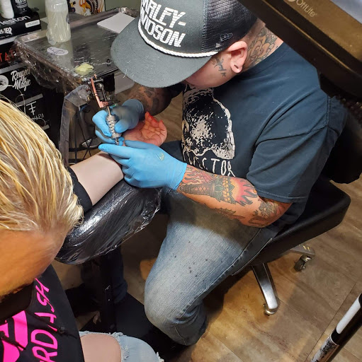 Explore calf tattoo ideas for women, creative tattoo ideas in North Charleston, available at Breakthrough Tattoo