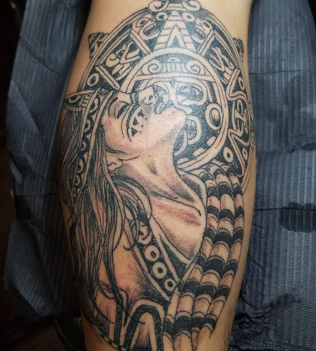 Explore bear paw tattoo ideas, creative tattoo ideas in Fort Mohave, available at RedRum Tattoo & Body Piercing Co.