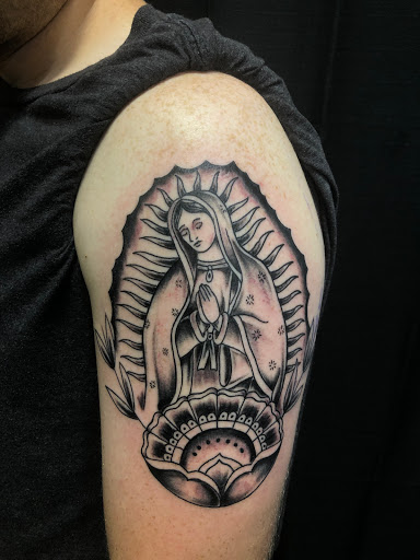 Explore snowboarding tattoo ideas, creative tattoo ideas in Mount Juliet, available at Division Street Tattoo Company