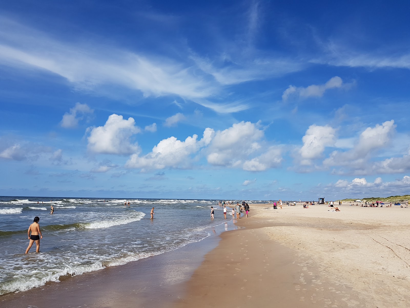 Foto af Sventoji pliazas med lys fint sand overflade