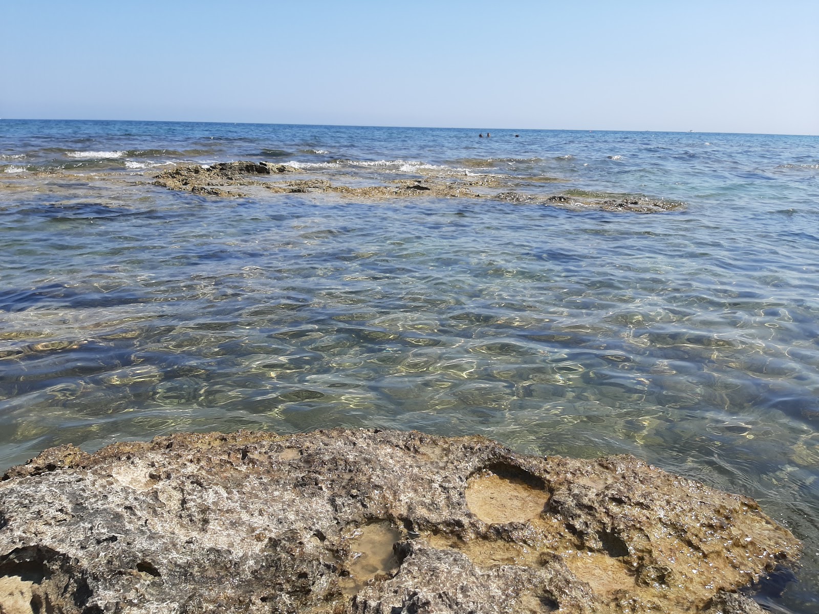 Photo of Libera blue wings beach with partly clean level of cleanliness