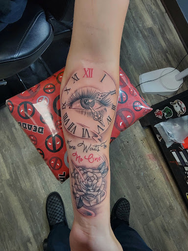 Explore christian sleeve tattoo ideas, creative tattoo ideas in Athens, available at United Ink Tattoos and Body Piercings