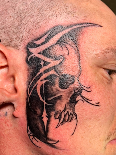 Find harley quinn and poison ivy tattoo ideas for your next unique tattoo in Warren at Inkognito Tattoo