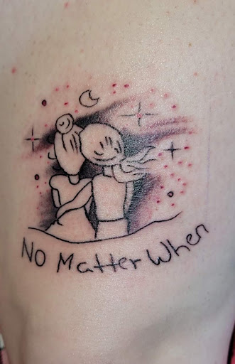 Explore red tattoo ideas women, creative tattoo ideas in Angola, available at Hoodlum Ink