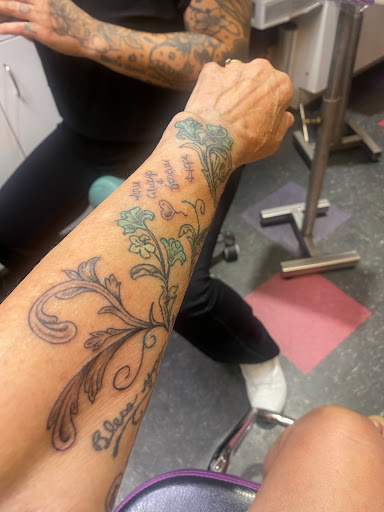 Explore spinal cord tattoo ideas, creative tattoo ideas in Fond Du Lac, available at In Your Face Tattooz LLC