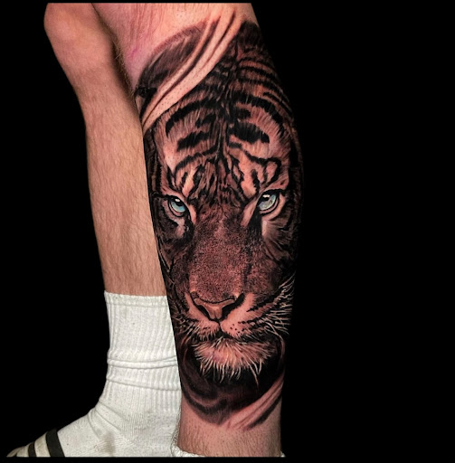 Explore tattoo cover up ideas for men, creative tattoo ideas in Johnson City, available at Gold Cross Tattoo Co.