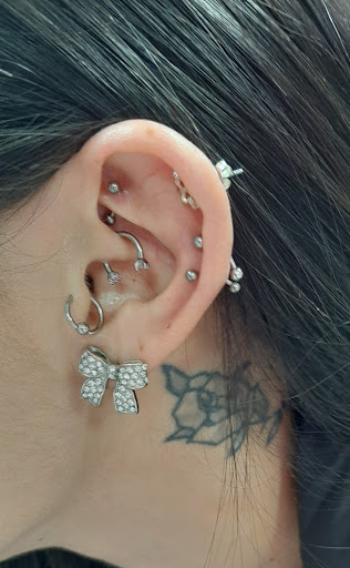 Explore tattoo ideas for women's arms, creative tattoo ideas in Altoona, available at Piercings by Pez