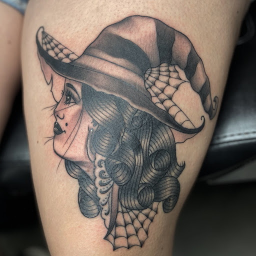 Explore hook tattoo ideas, creative tattoo ideas in Superior, available at Northlandia tattoo parlor