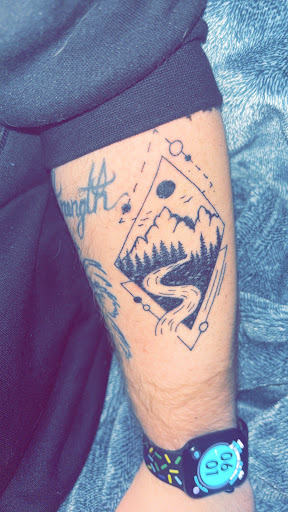 Explore rainbow baby tattoo ideas, creative tattoo ideas in Omaha, available at Eye Candy West Tattoo shop